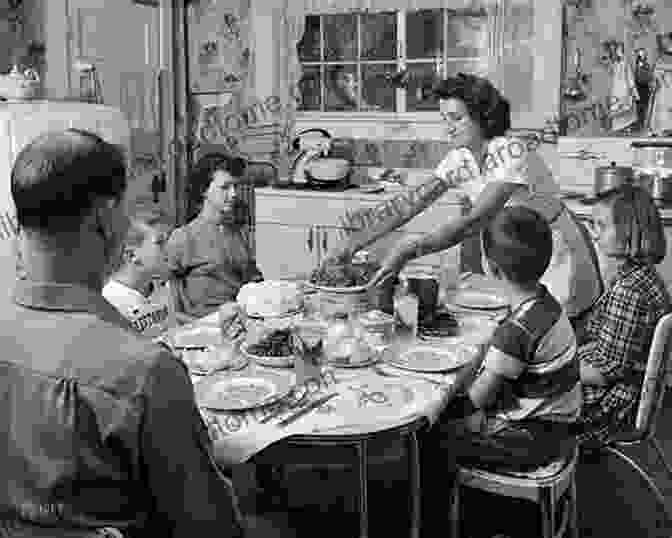 A Family Gathered Around A Dinner Table In The 1940s. Rich History: Railroad Cars Yards Workers: Vibrant Images Of American Life From The 1940s