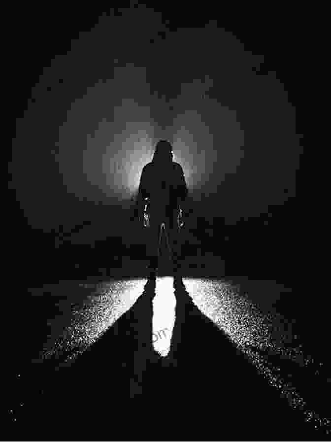 A Shadowy Figure Walking Down A Dark Road, Surrounded By Mist Walking The Night Road: Coming Of Age In Grief