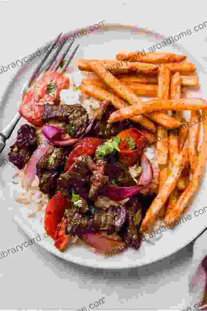 A Sizzling Plate Of Lomo Saltado, Featuring Stir Fried Beef, Onions, Tomatoes, And Potatoes Your Guide To Peruvian Cooking And Cuisine: Explore The Diversity Of Peruvian Cuisine