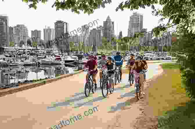 Family Cycling Along The Scenic Seawall On Granville Island Granville Island ABC: A Family Adventure