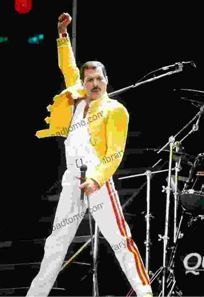 Freddie Mercury Captivating The Crowd At Live Aid, Delivering An Unforgettable Performance Freddie Mercury: An Illustrated Life