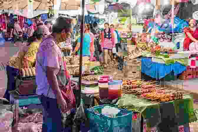 Night Market Scene With Stalls Selling Toys, Food, And Other Items, And People Walking Around Night Market Maria Isabel Sanchez Vegara